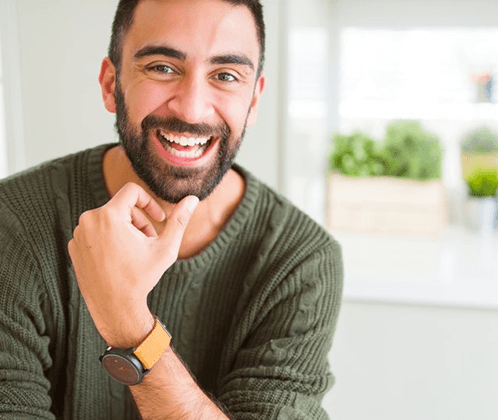 a man with dental implants enjoying a healthy smile