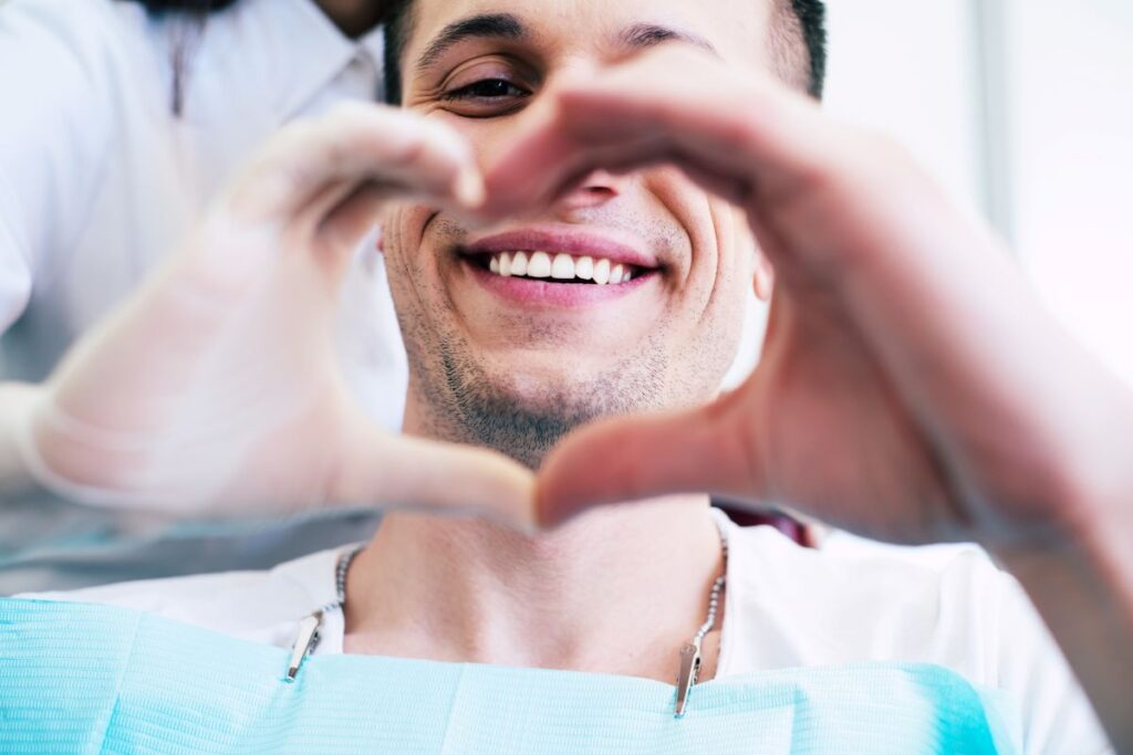 A smiling man in a dentist’s chair
